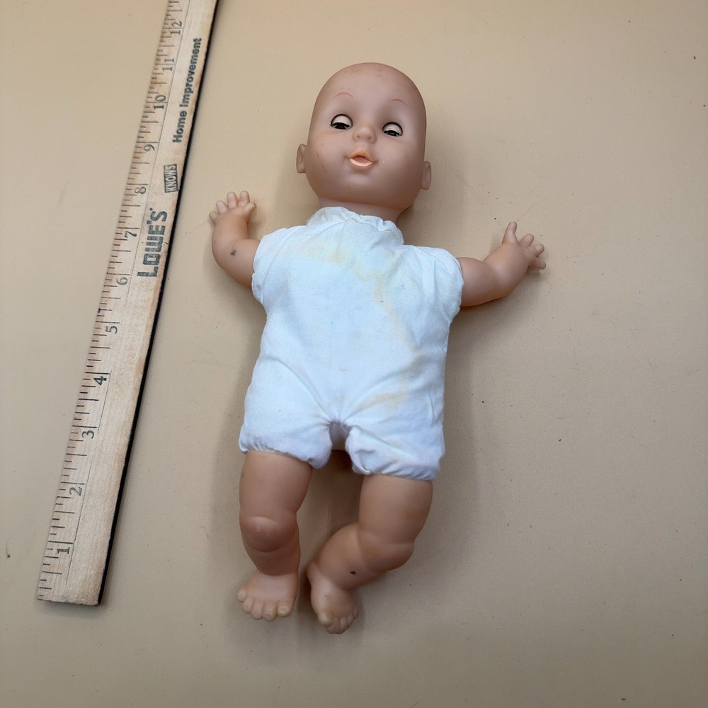 VTG Uneeda Doll Co Baby Doll Soft Body Vinyl Head Arms Legs White Romper 11 Inch